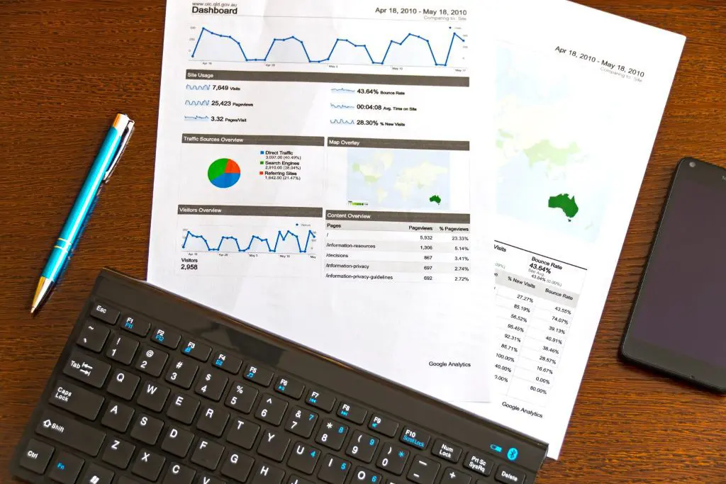 Datasheets next to a keyboard and pen