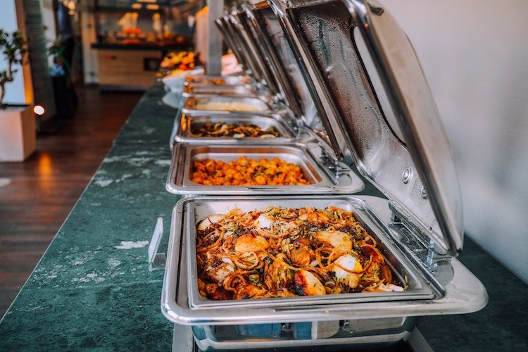 Buffet trays of hot food